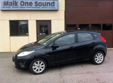2012 Ford Festiva with professional window tint in North Bay